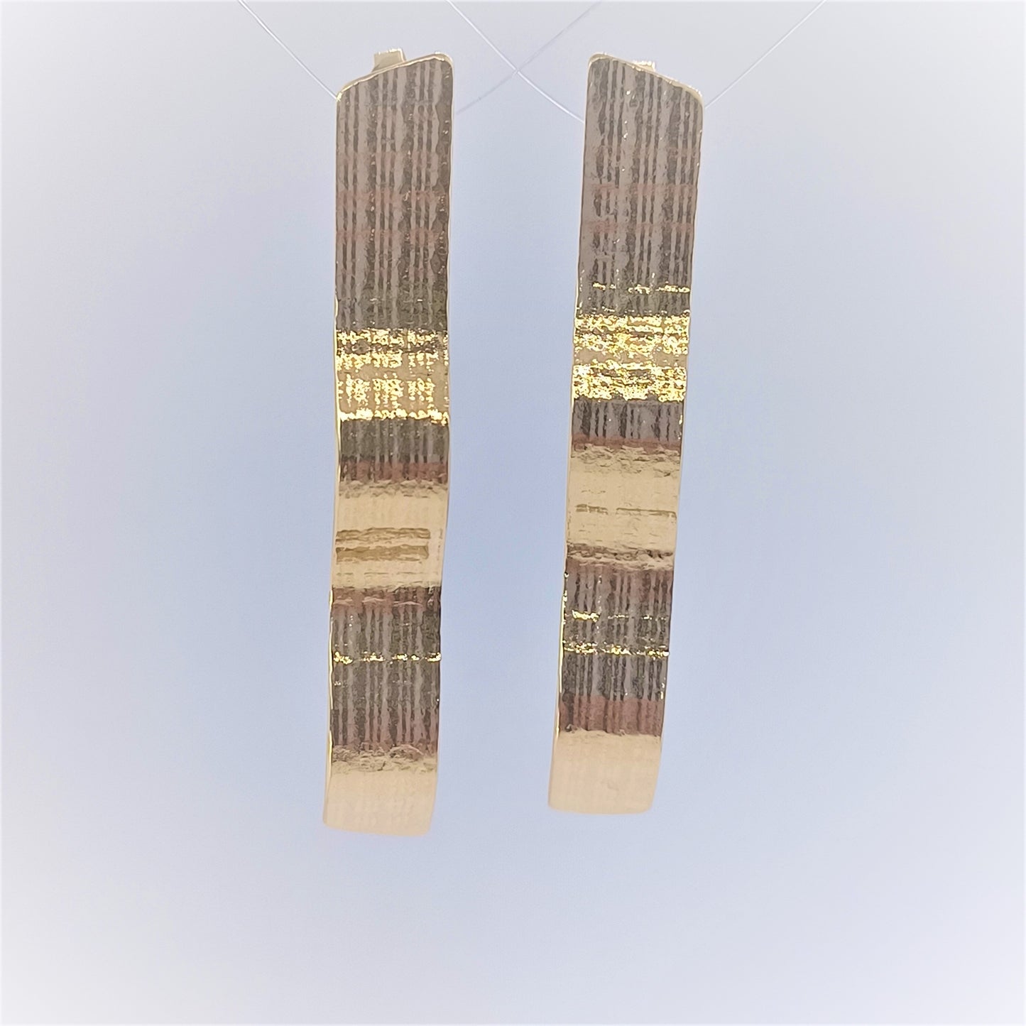 Boucles d'oreilles ondulées en Plaqué Or, motif dentelle