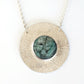 Collier en argent massif texturé et Émeraude naturelle