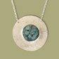 Collier en argent massif texturé et Émeraude naturelle