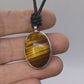 Pendentif en Argent Massif et Oeil de Tigre. Pièce unique