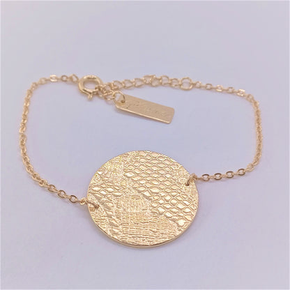Bracelet médaille en Plaqué Or, motif dentelle